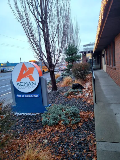 The ACMAN Solutions monument sign at 1500 W Court Street in Pasco, Washington
